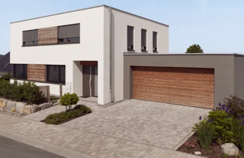 Wohngebäude mit Garage und Einfahrt