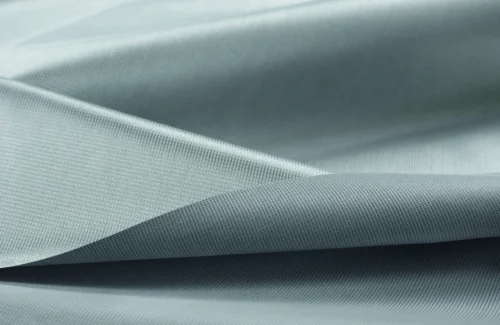 Nahaufnahme eines weichen, blauen Stoffes mit feiner Textur